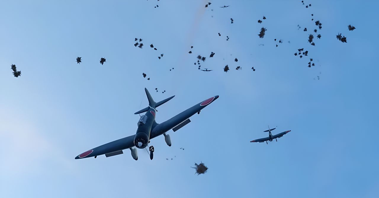 Mặc dù lực lượng CAP của Mỹ không được triển khai tốt lúc bắt đầu cuộc giao tranh, nhưng họ đã làm tốt việc làm giảm đội hình 18 máy bay ném bom bổ nhào của Kobayashi xuống chỉ còn 7 chiếc, buộc họ phải thực hiện một cuộc tấn công rời rạc. Lúc 12 giờ 09 phút, các quan sát viên trên Yorktown phát hiện người Nhật đang tiếp cận từ phía sau và góc phải mạn phải của con tàu. Một phút sau đó, những máy bay ném bom bổ nhào còn sống sót bắt đầu tấn công. Ba máy bay ném bom bổ nhào đầu tiên tiếp cận từ phía sau và tấn công liên tiếp nhanh chóng vào lúc 12 giờ 11 phút. Chiếc đầu tiên, do phi công không rõ danh tính điều khiển, đã giữ cú bổ nhào xuống dưới 1.000 feet để đảm bảo trúng đích. Mặc dù phải đối mặt hỏa lực phòng không dày đặc, phi công vẫn có thể thả quả bom của mình, quả bom lộn nhào về phía Yorktown. Quả bom nổ mạnh trúng gần thang nâng giữa tàu, xuyên xuống boong chứa máy bay và gây ra hỏa hoạn. Chiếc Val bị trúng đạn từ một trong những bệ pháo bốn nòng 1,1 inch của tàu sân bay nằm phía sau đảo chỉ huy ngay khi nó thả bom, vỡ tan thành ba mảnh, và sau đó đâm xuống vệt nước sau đuôi của Yorktown. Vụ nổ của quả bom nổ mạnh gây thương vong nặng nề cho các tổ pháo thủ của hai bệ pháo bốn nòng 1,1 inch phía đuôi, các pháo 20mm gần đó, và nhân sự gần cuối đảo và trên boong chứa máy bay phía dưới. Hành động của 7 máy bay ném bom bổ nhào sống sót qua các máy bay Wildcat và thực sự thực hiện một cuộc tấn công đã khẳng định danh tiếng của Đơn vị Máy bay Ném bom Tàu sân bay Hiryu như một phi đội ưu tú. Hai máy bay nữa ghi thêm phát trúng trực tiếp, và thêm hai chiếc nữa gây ra những phát suýt trúng gây hư hại. Khi chiếc máy bay ném bom bổ nhào Nhật cuối cùng rời khỏi chiến trường, Yorktown đã chết máy giữa biển với làn khói đen dày đặc bốc lên từ giữa tàu. Mặc dù có vẻ như người Nhật đã gây ra thiệt hại nghiêm trọng cho một tàu sân bay Mỹ, nhưng phi đội máy bay ném bom bổ nhào của Hiryu đã tan nát. Trong số 18 máy bay được cử đi ngay trước 11 giờ, chỉ có 5 chiếc trở về ngay sau 13 giờ. Trong số 13 chiếc Val bị phá hủy, các máy bay Wildcat chịu trách nhiệm cho 11 chiếc và hỏa lực phòng không cho 2 chiếc cuối cùng. Chỉ có một trong số 4 chiếc Zero đi cùng đợt tấn công sống sót. Sau khi hạ cánh, chiếc Zero và một trong những máy bay ném bom bổ nhào đã bị loại bỏ do hư hại nghiêm trọng.(Ảnh từ Task Force Admiral)