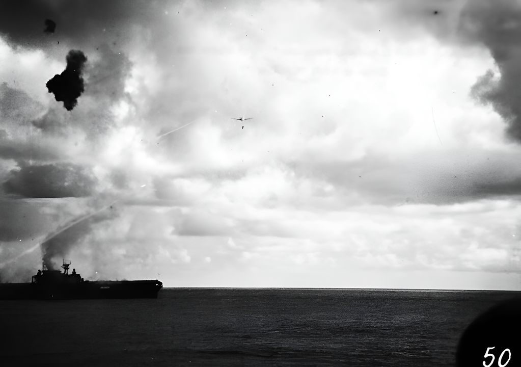 Một máy bay Type 97 đang thả ngư lôi xuống vào vị trí của tàu Hornet sắp đi qua ở bên dưới. Ảnh được chụp từ USS Pensacola. (NHHC)
