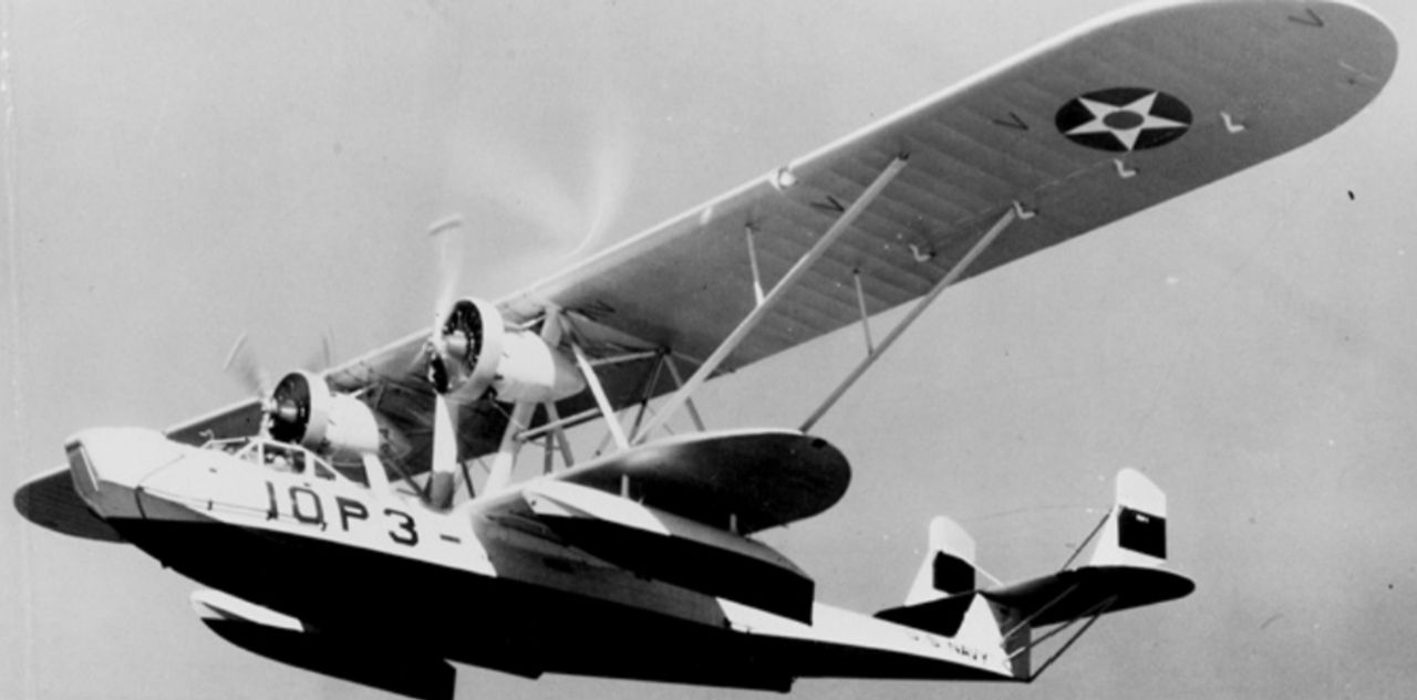 Công ty Consolidated Aircraft đã phát triển mẫu P2Y từ phiên bản trước đó là XPY-1, và loại máy bay này phục vụ trong các phi đoàn tuần tra của Hải quân Mỹ cho đến khi được thay thế bằng PBY Catalina của cùng công ty từ năm 1937. Trớ trêu thay, Kawanishi đã mua một chiếc P2Y-1 để Không lực Hải quân Đế quốc Nhật Bản (IJNAF) dùng cho mục đích đánh giá. (NH-94803, Naval History and Heritage Command – NHHC)