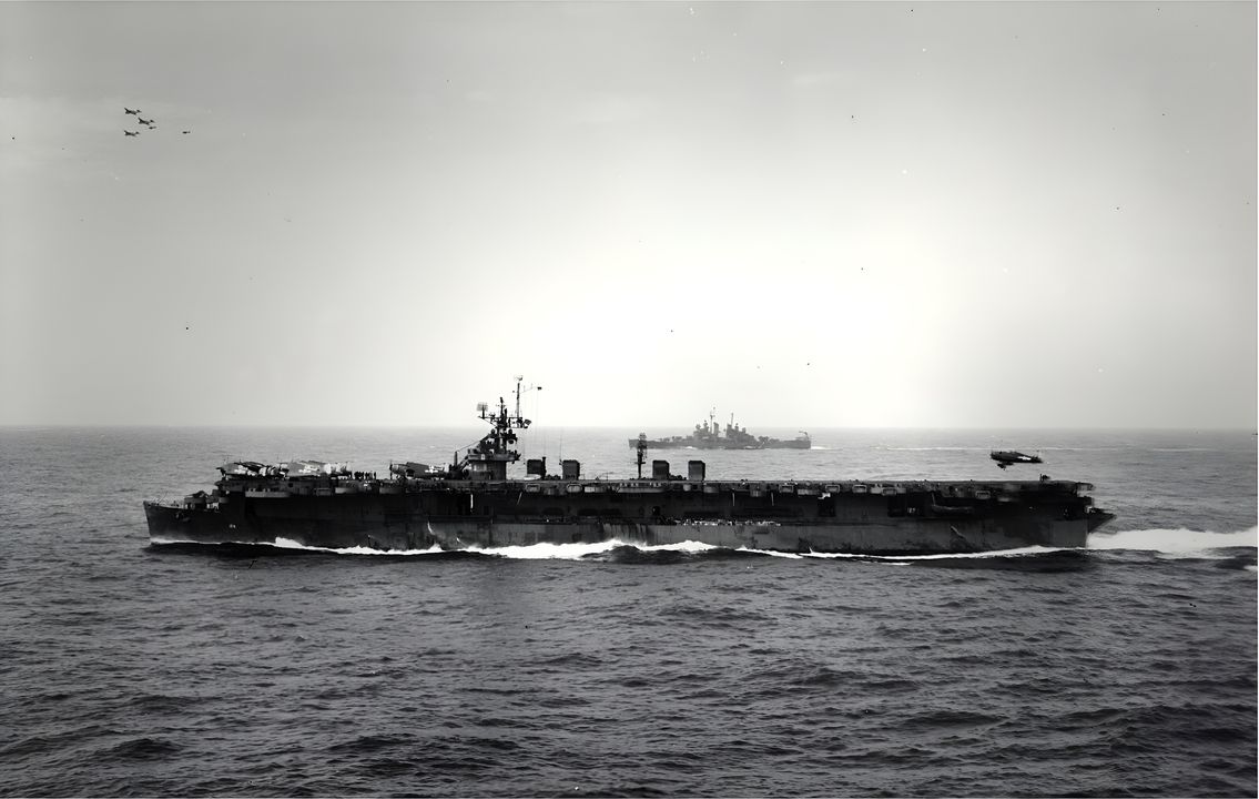 Tàu sân bay hạng nhẹ USS Cabot (CVL-28) được biên chế cùng Intrepid trong Nhóm đặc nhiệm 38.2 (TG 38.2) trong trận Vịnh Leyte, và Không đoàn Tàu sân bay số 29 của Cabot đã hoạt động rất tích cực trong các đợt tấn công Musashi vào ngày 25 tháng 10. Trong bức ảnh này, Cabot đang cơ động dưới cuộc tấn công kamikaze của Nhật vào ngày 25 tháng 11 – cũng chính là ngày Intrepid bị hai máy bay kamikaze đánh trúng. (Real War Photos)